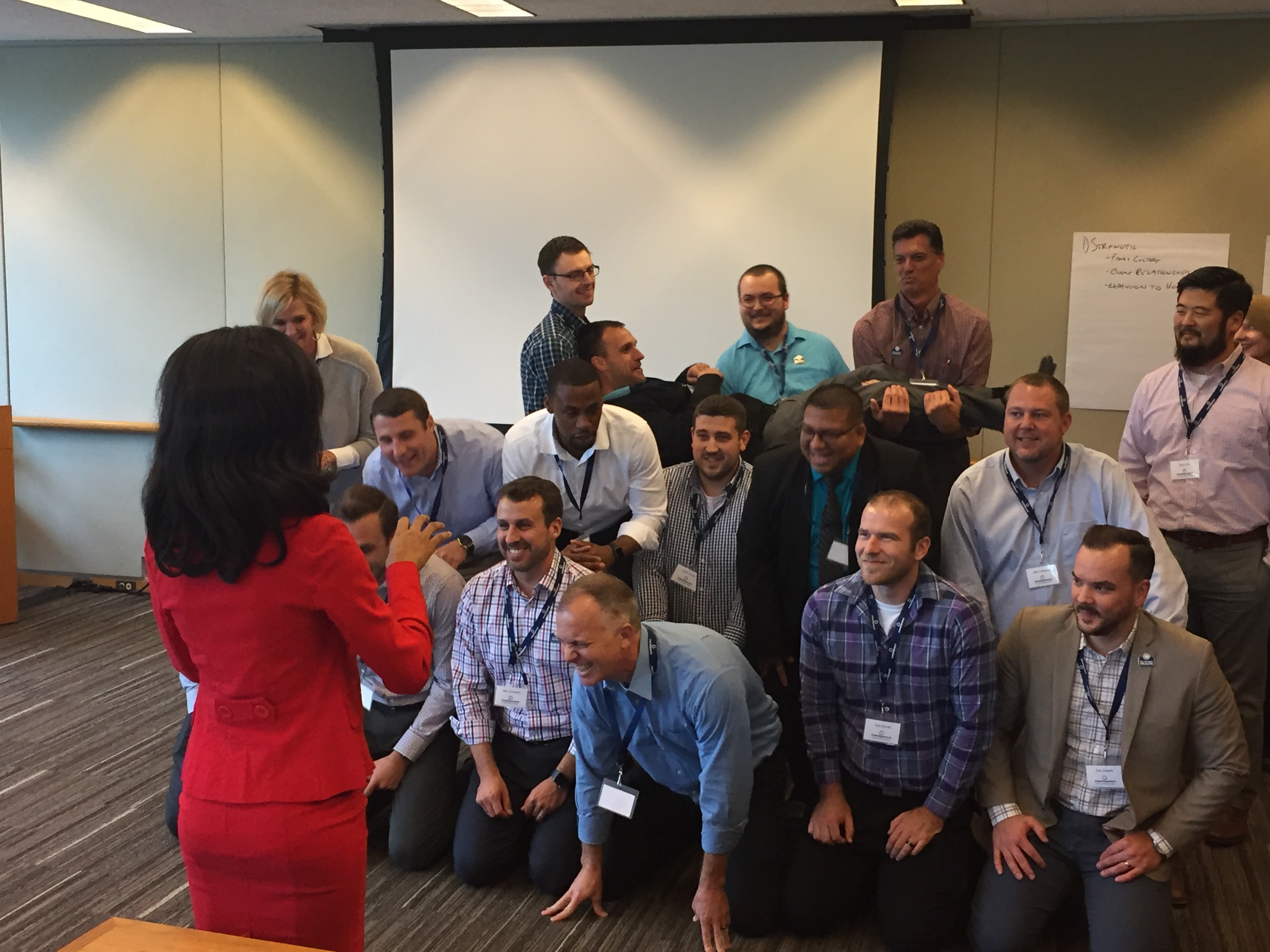 Group of professionals gathered in conference room
