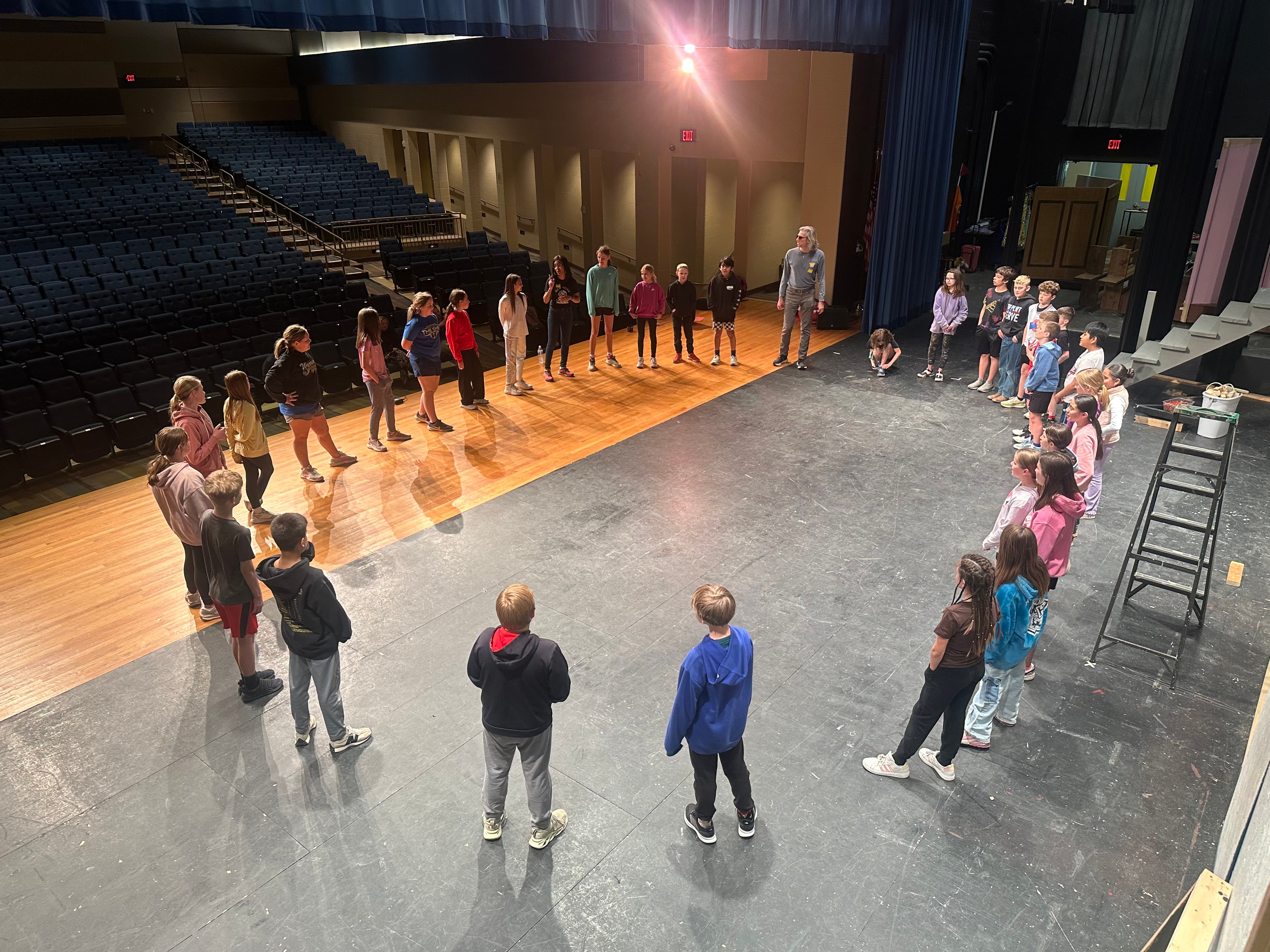 Students in theater improv activity